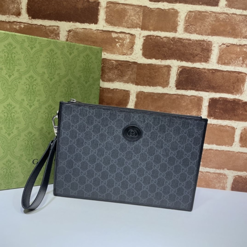 G*u*i clutch bags